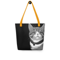 Cat close up striking eyes tote bag